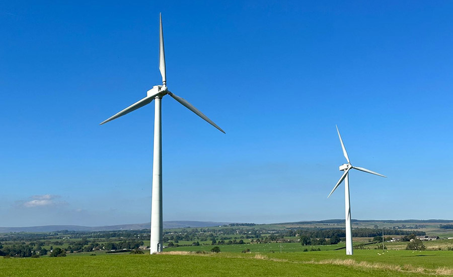 Two wind turbines side by side